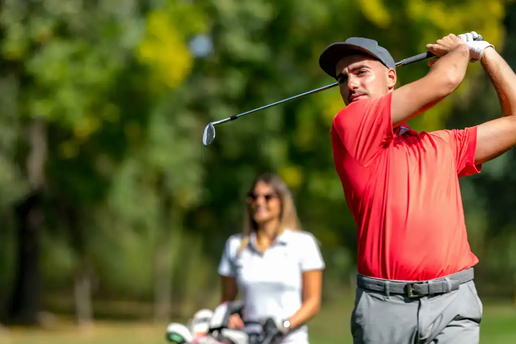 golfing-couple-at-a-tee-box-enjoying-a-game-of-go-2026-03-10-02-07-44-utc