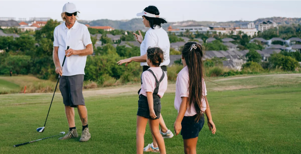Family enjoying a day on golf course.